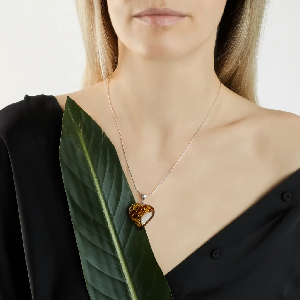 Amber pendant heart on a silver chain