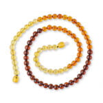 shiny rainbow sphere Baltic amber beads necklace