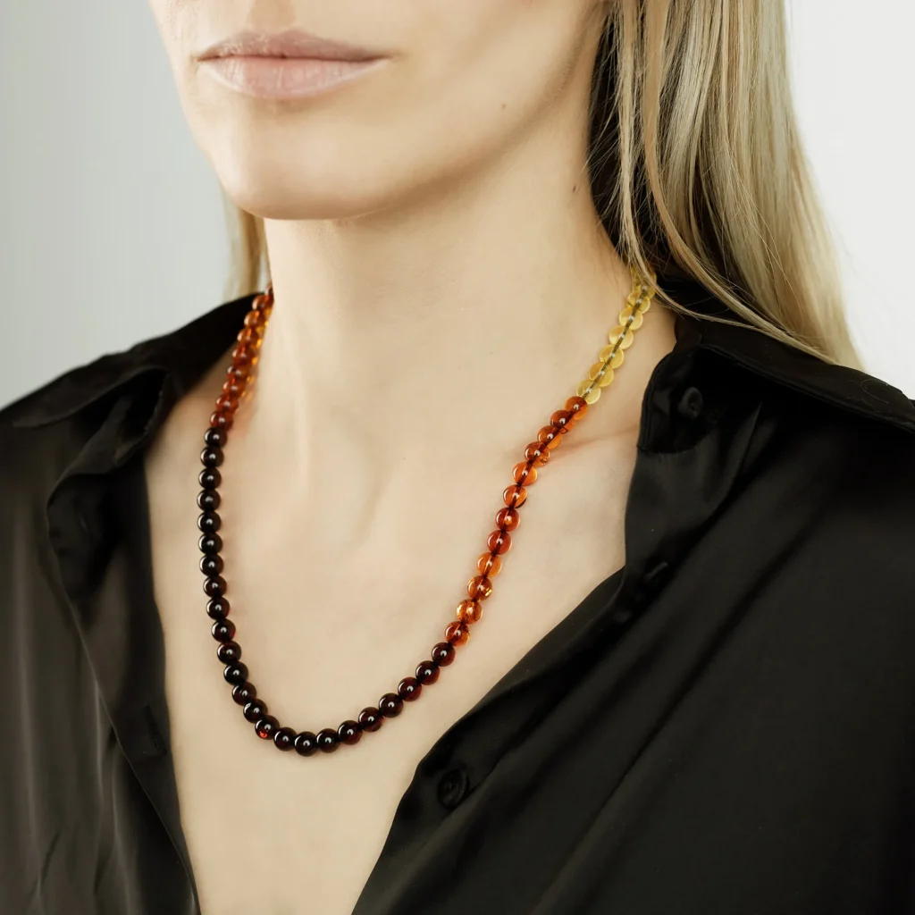 shiny rainbow sphere Baltic amber beads necklace