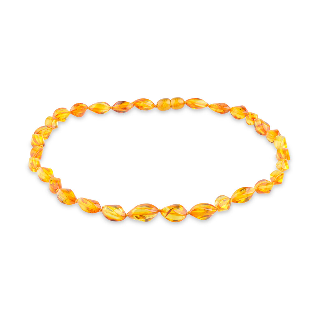 Honey color amber necklace with curve shape beads