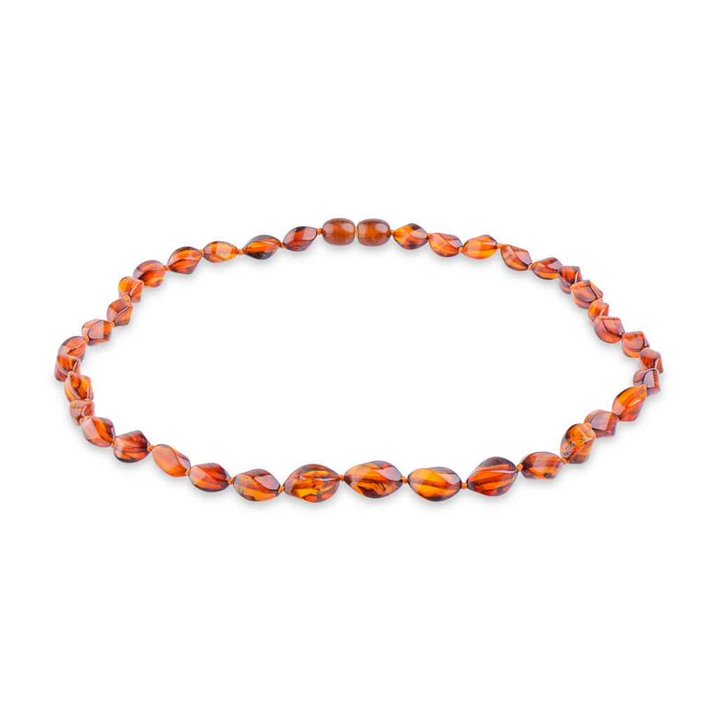 Cognac color amber necklace with curve shape beads