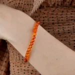 cognac color amber bracelet with a rose