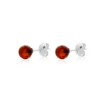 Dark cognac sphere amber earrings on silver studs